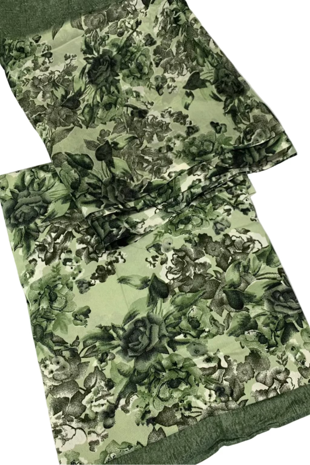 Green floral patterned fabric on a white background