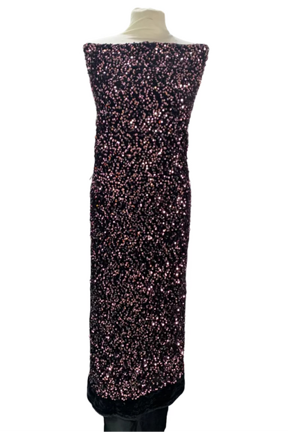 Sparkling black dress on a mannequin in a fabric store
