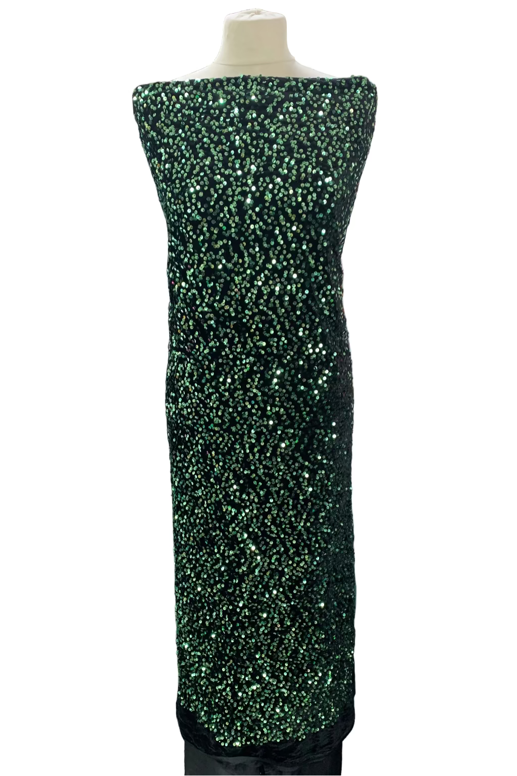 Green sequin dress on a mannequin in a fabric store
