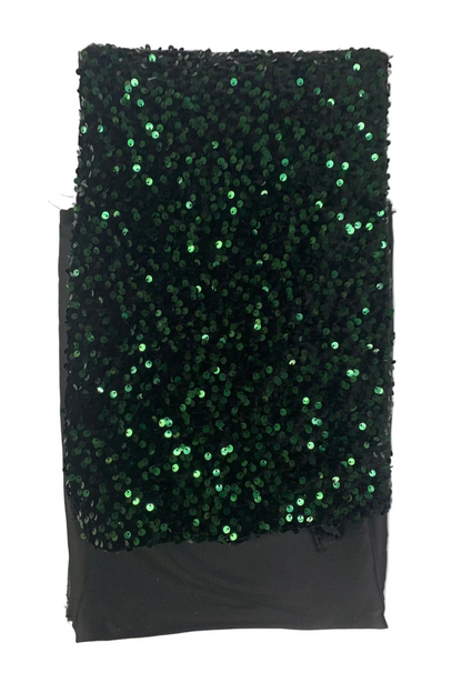 Black fabric with green sequins on a white background