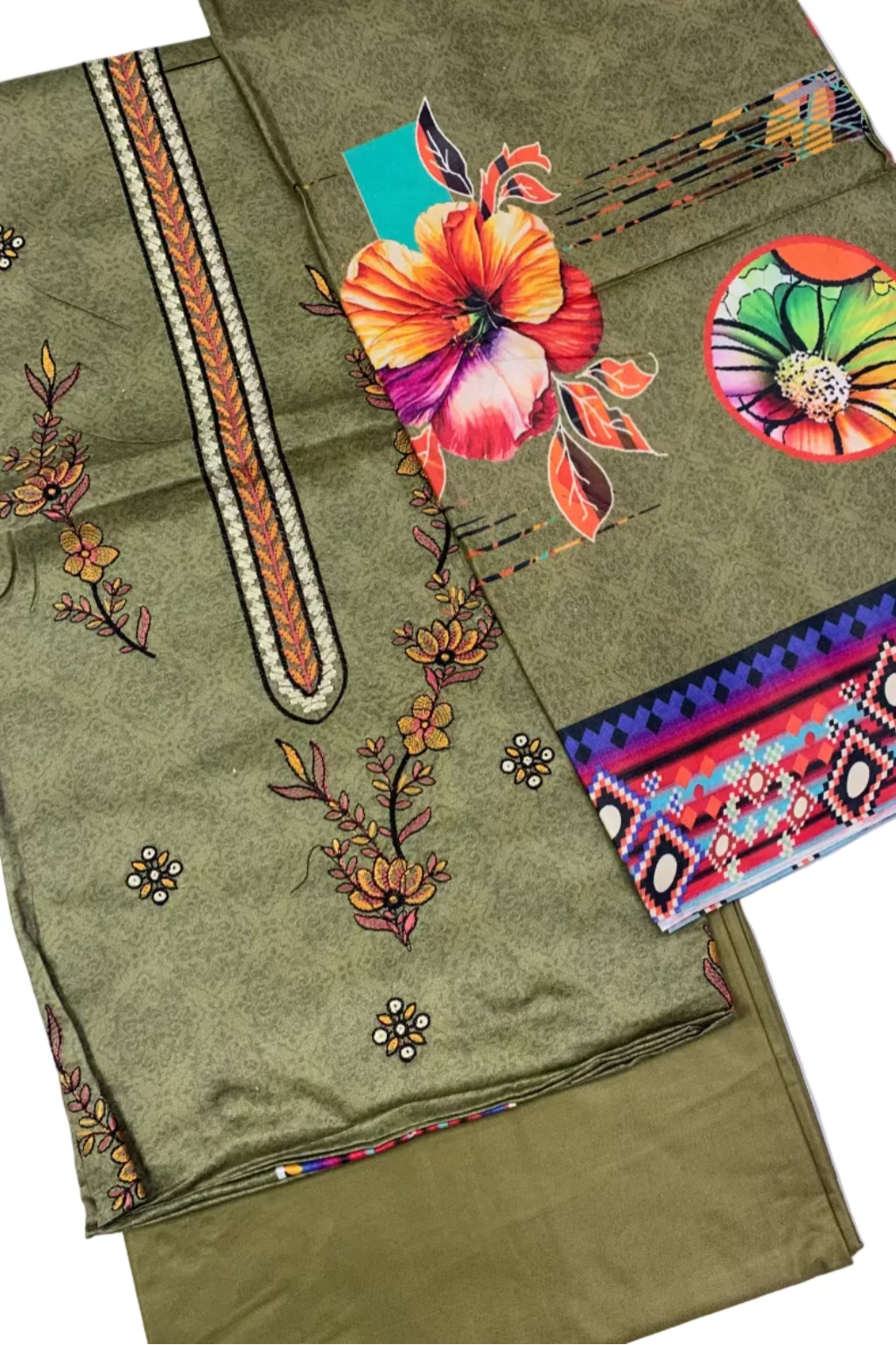 Green fabric with floral embroidery and colorful patterns on a white background