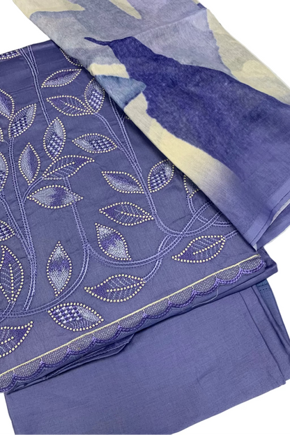 Purple fabric with leaf pattern and plain purple fabric on a white background