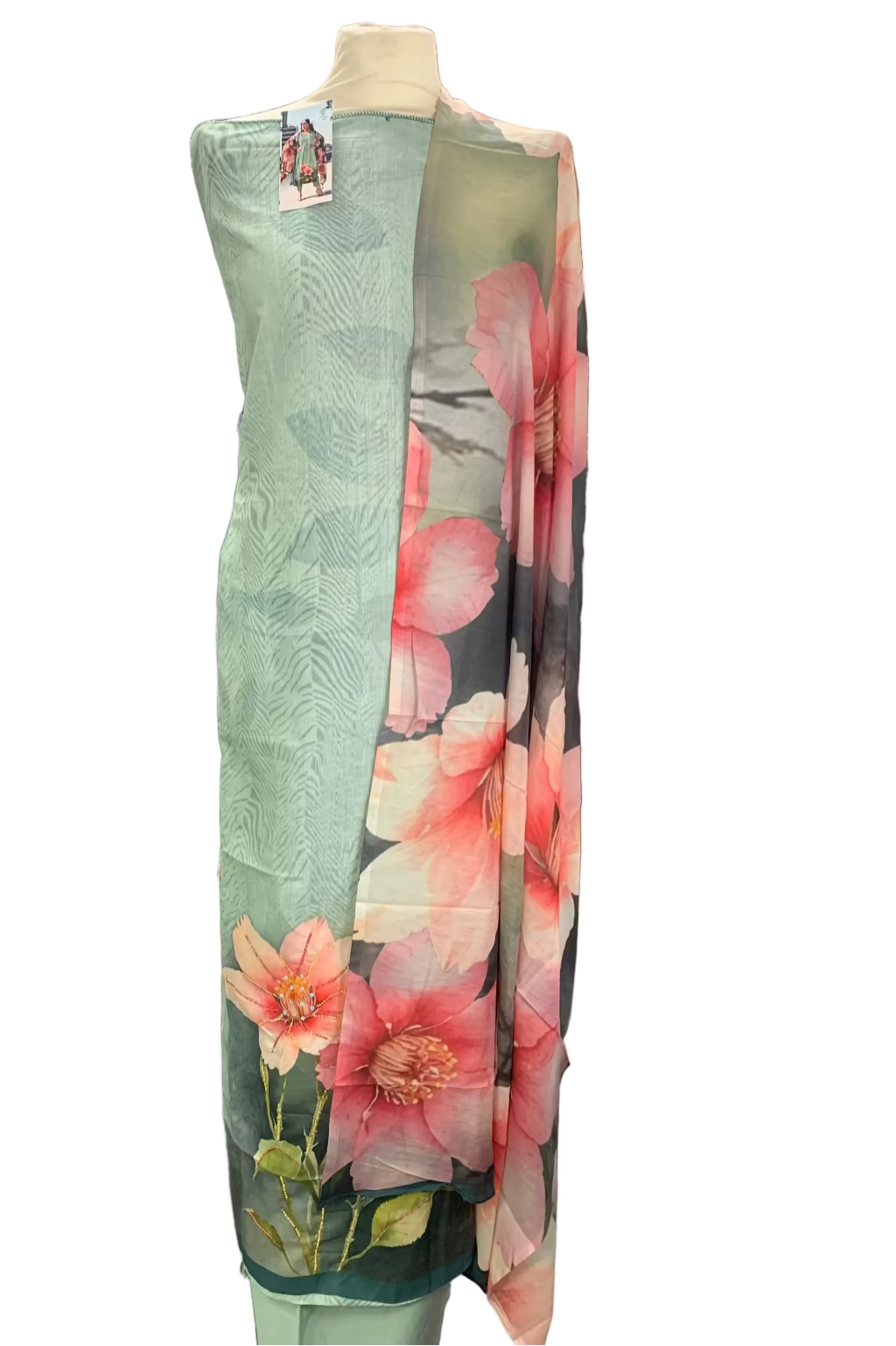 Floral-patterned fabric on a mannequin in a fabric store