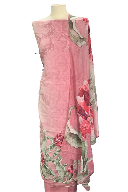 Mannequin wearing a pink floral dress in a fabric store