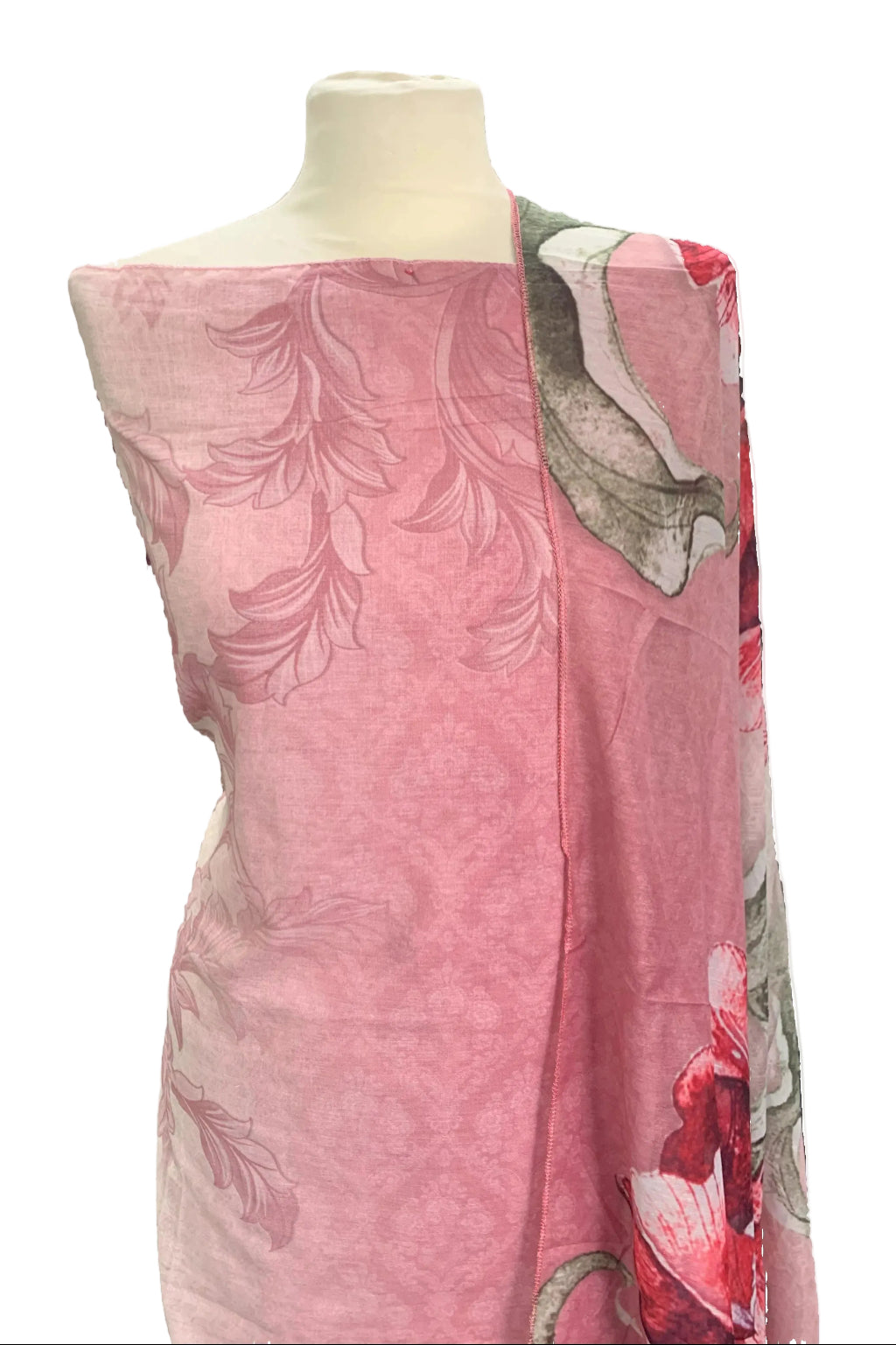 Mannequin wearing a pink floral dress in a store setting