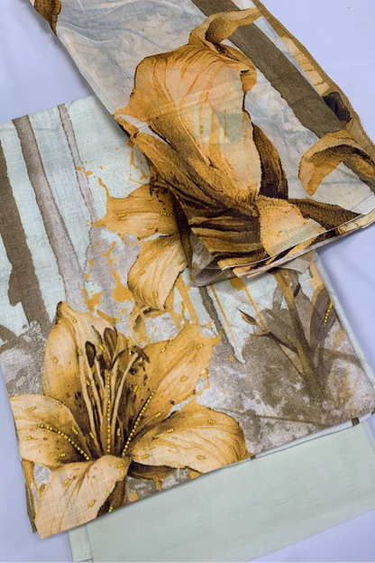 Floral patterned fabric with gold and brown tones on a white background