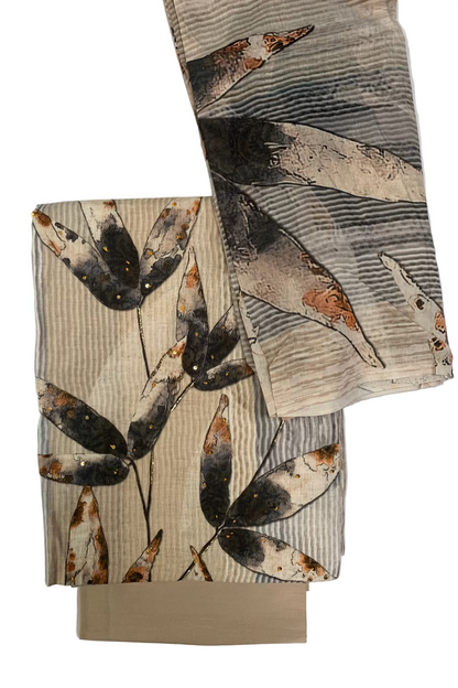 Two folded fabric pieces with leaf pattern on a white background