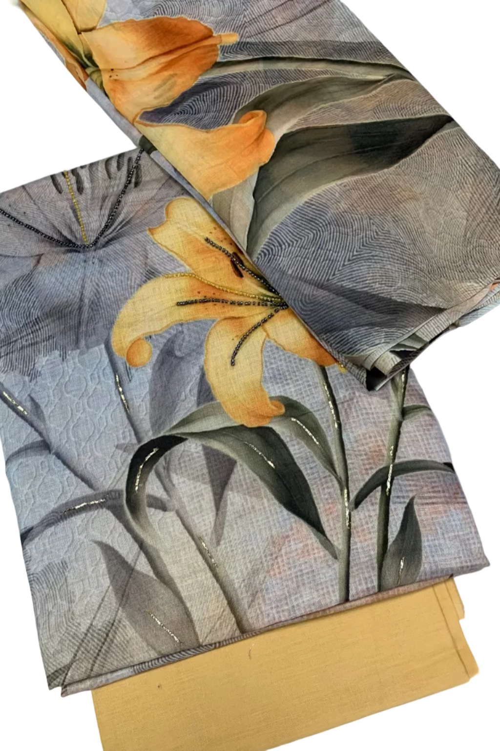 Floral patterned fabric with orange flowers and gray leaves on a white background