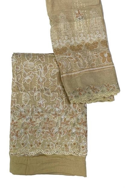Yellow fabric with intricate white lace patterns on a white background