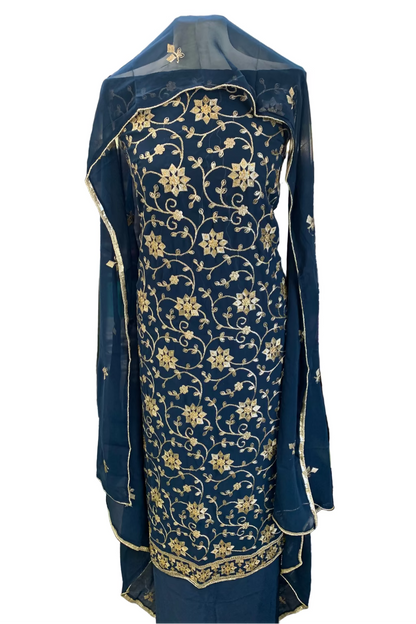 Blue embroidered garment in a store setting