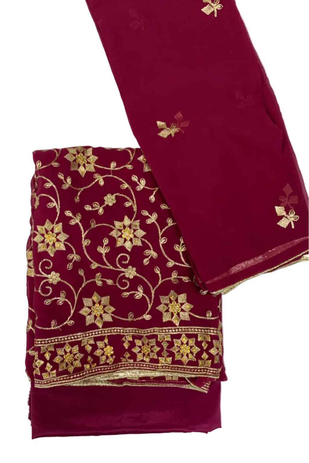 Pink fabric with gold floral embroidery on a white background