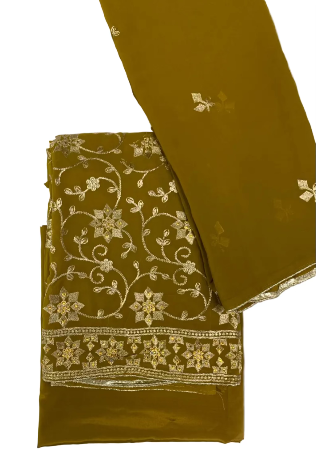 Mustard fabric with floral embroidery on a white background