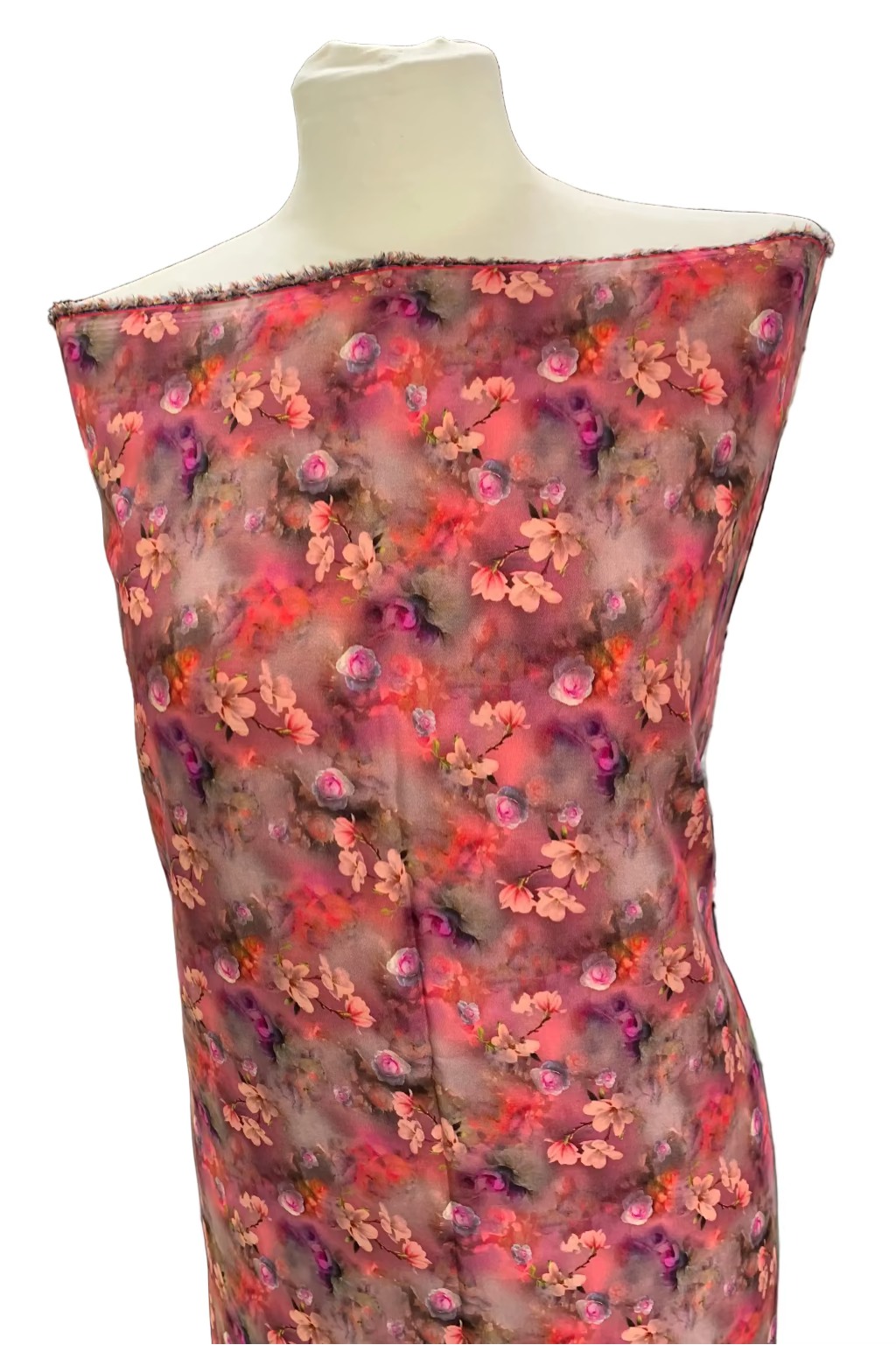Mannequin wearing a floral dress with pink and red flowers on a white background