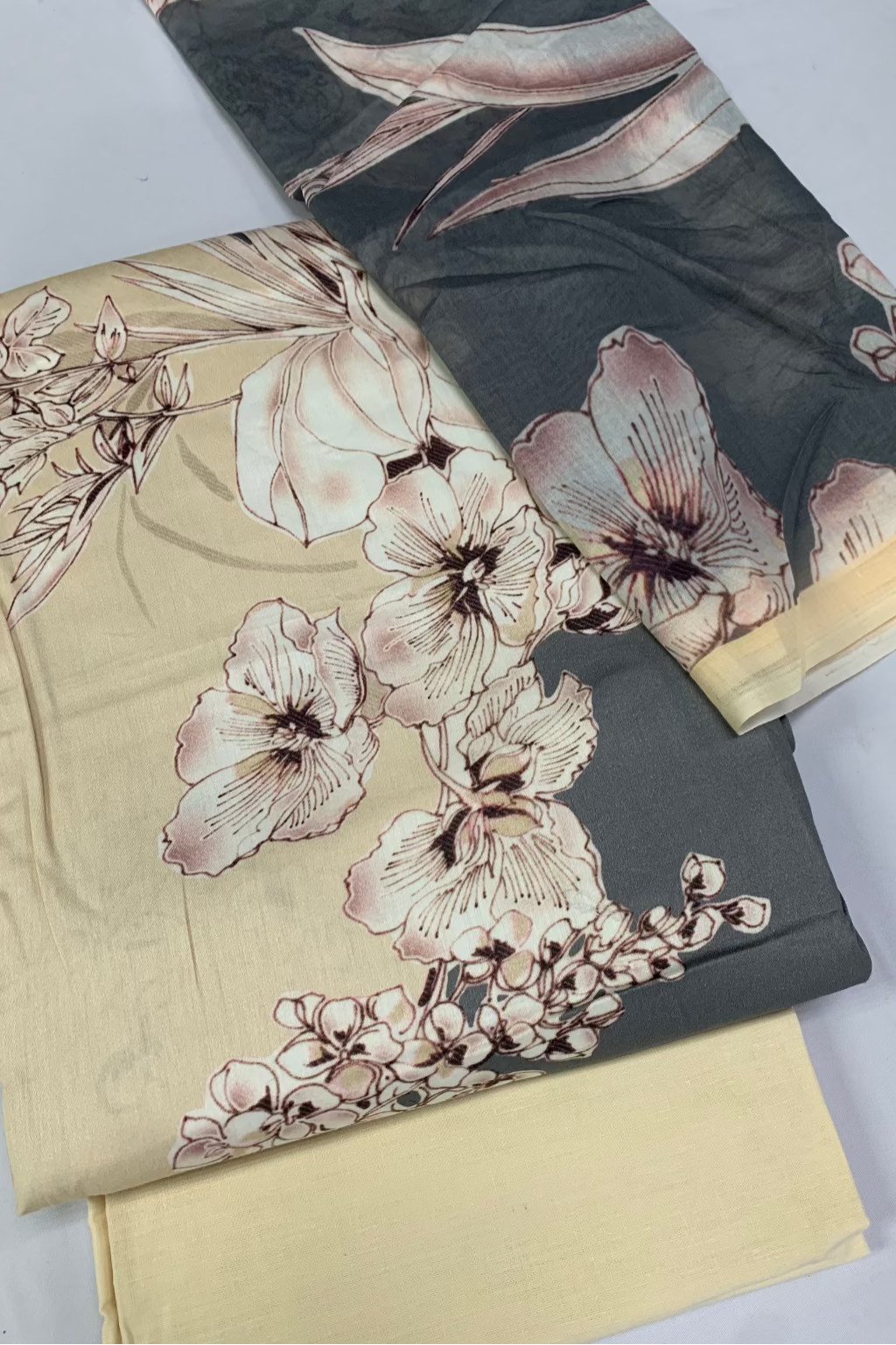 Fabric with floral patterns on a whitbackground
