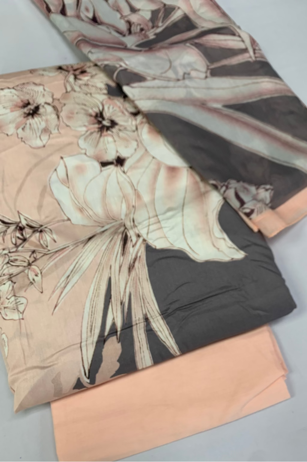 Floral and abstract patterned fabric on a white background
