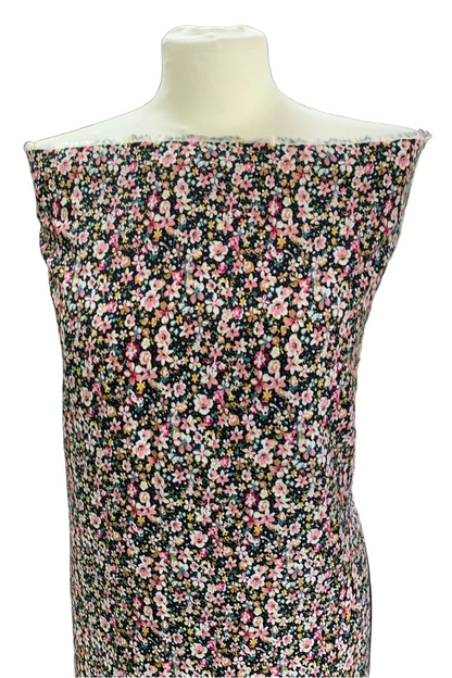Floral dress on a mannequin in a fabric store