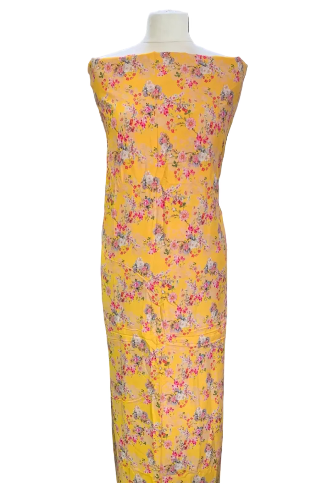 Yellow floral dress on a mannequin in a fabric store