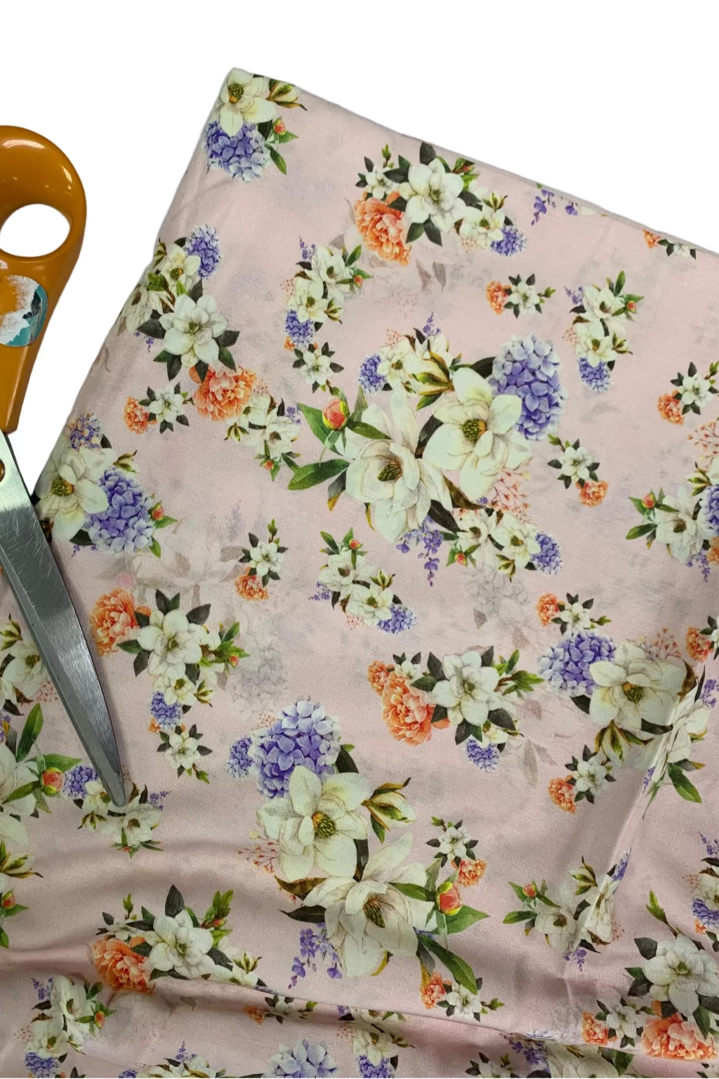 Floral fabric with scissors on a white background