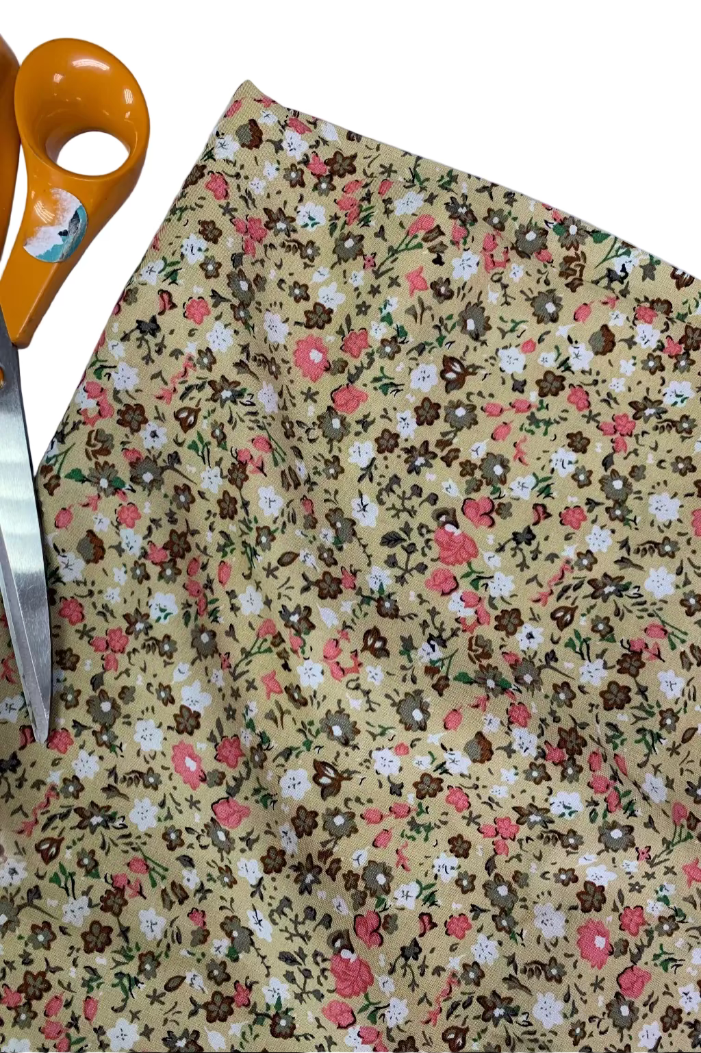 Floral fabric with scissors on a white background