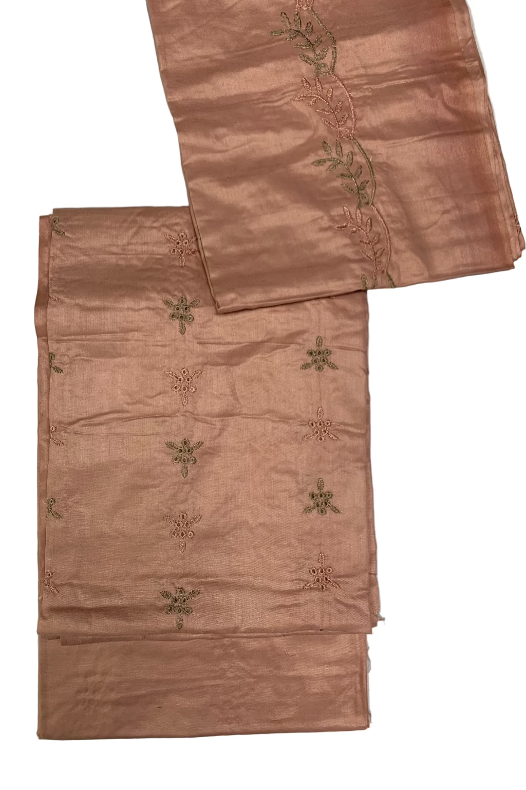 Two pink fabric panels with embroidered patterns on a white background