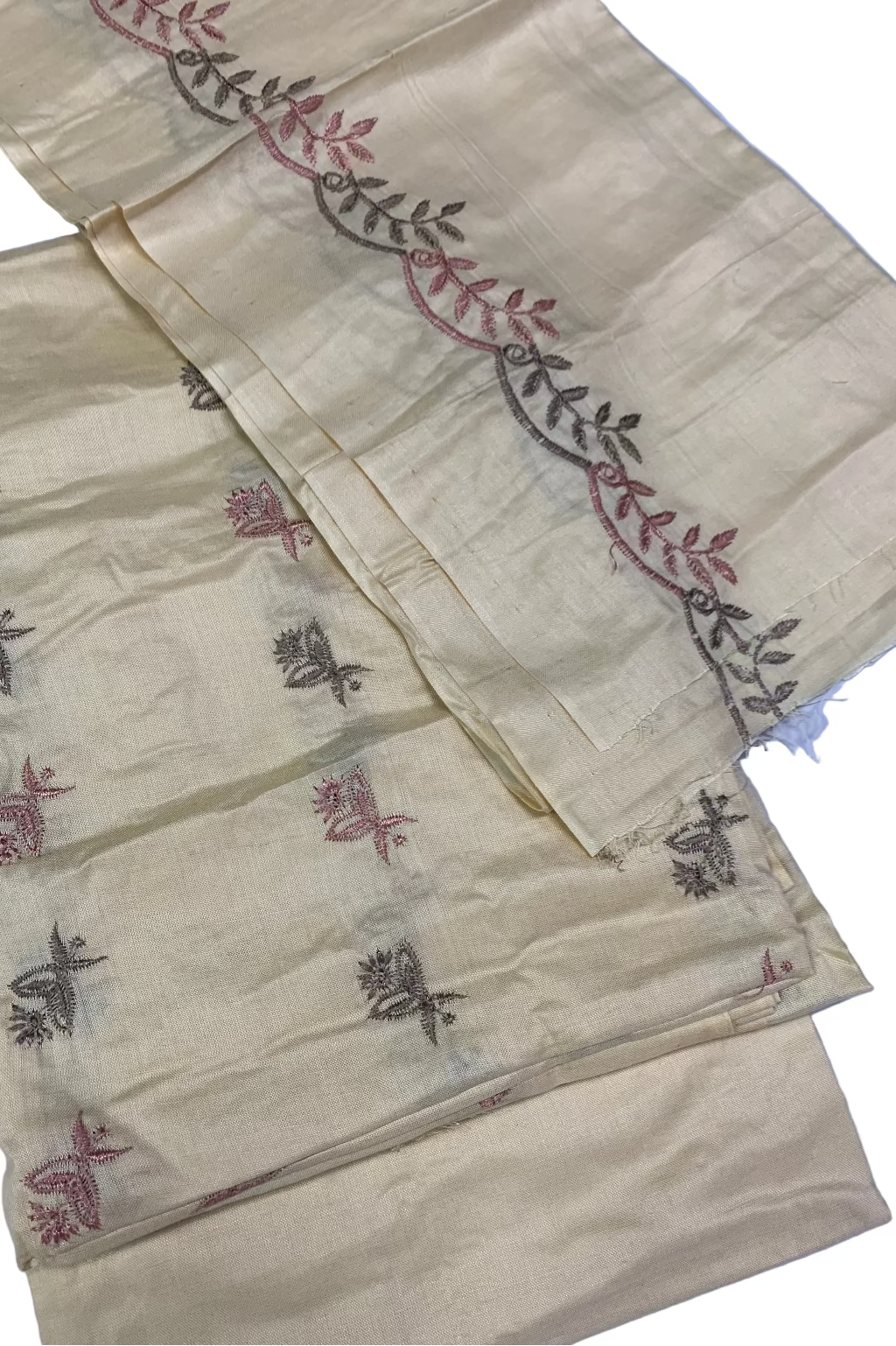 Beige fabric with floral embroidery on a white background