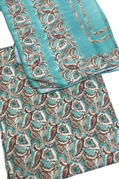Teal fabric with intricate paisley pattern on a white background