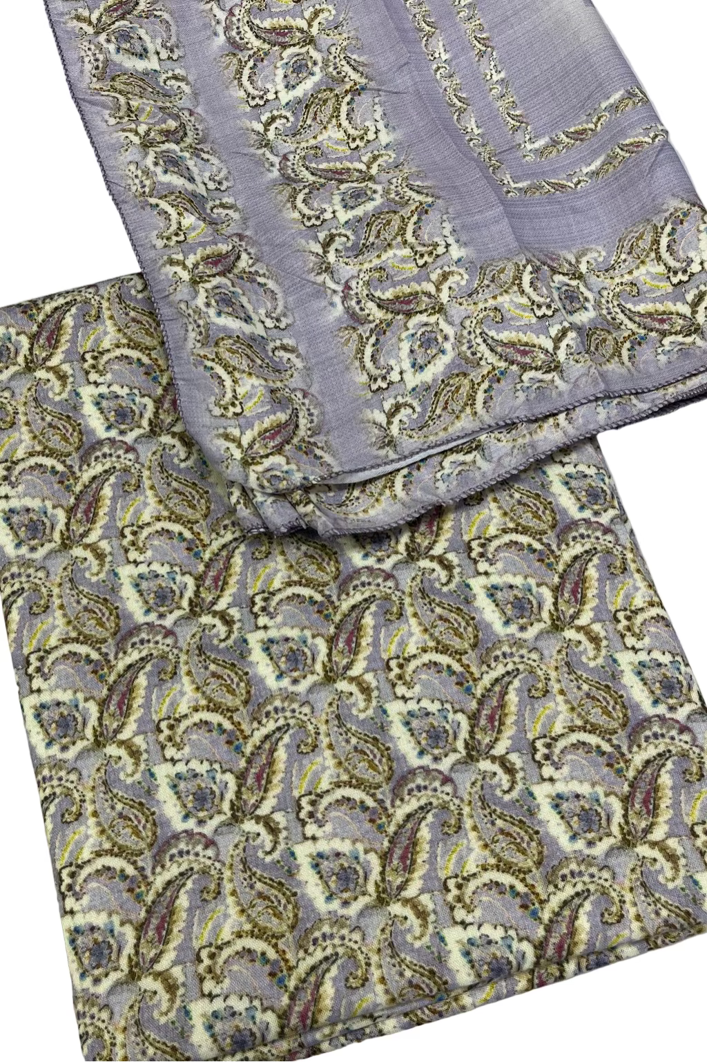 Two folded fabric pieces with intricate paisley patterns on a light gray background