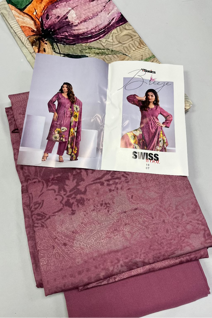 Purple fabric with a magazine featuring a model wearing a similar outfit on a light gray background