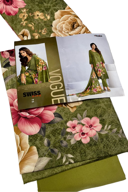 Green fabric with floral patterns and Vogue magazine on a white background
