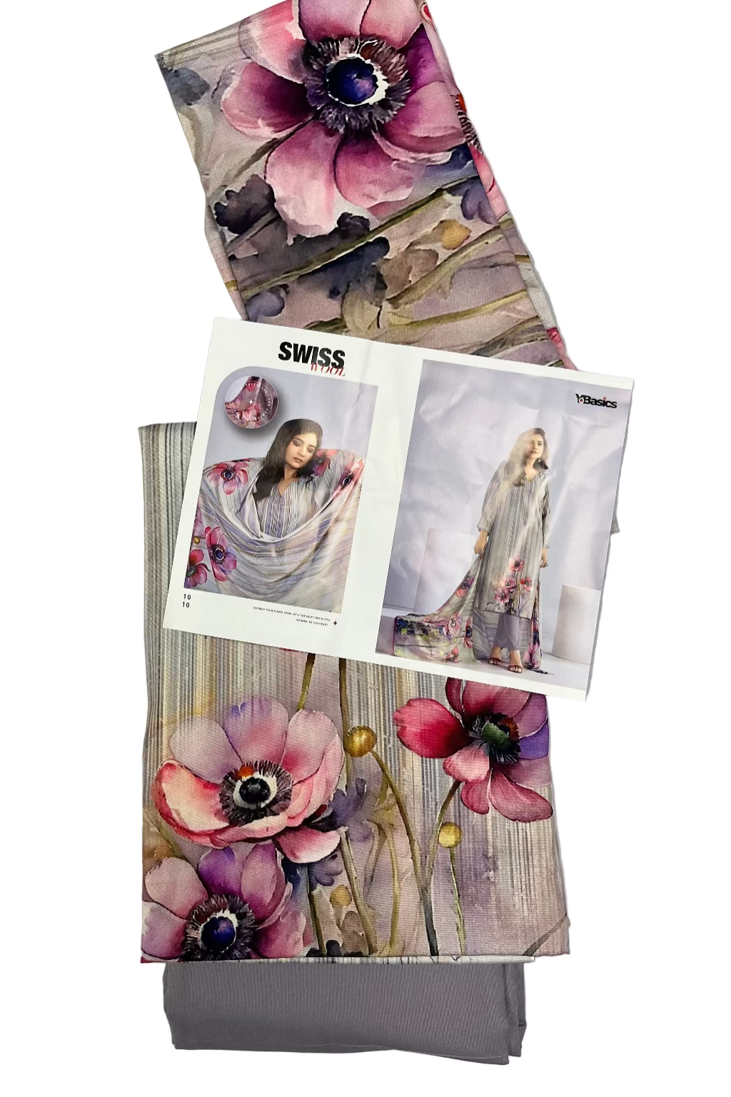 Floral-patterned fabric with a magazine featuring a model wearing a floral dress on a gray background