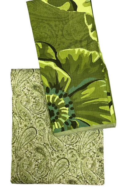 Two green patterned fabrics on a white background